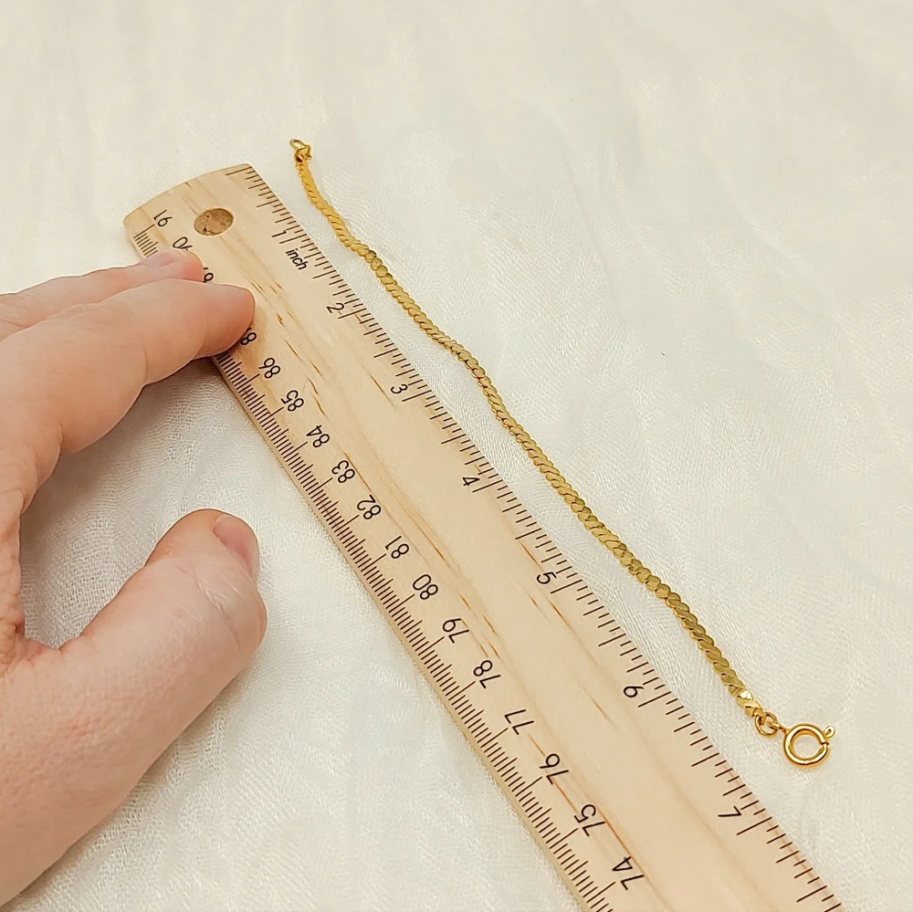Gold tone thin flat chain woven bracelet neutral classic preppy style